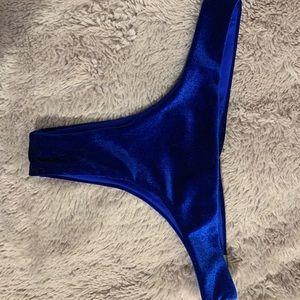 Dark blue thong swimsuit bottoms